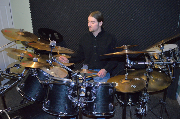 Derek Houle with drum set