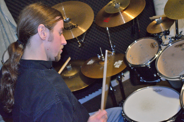 Derek Houle Playing Drum Set