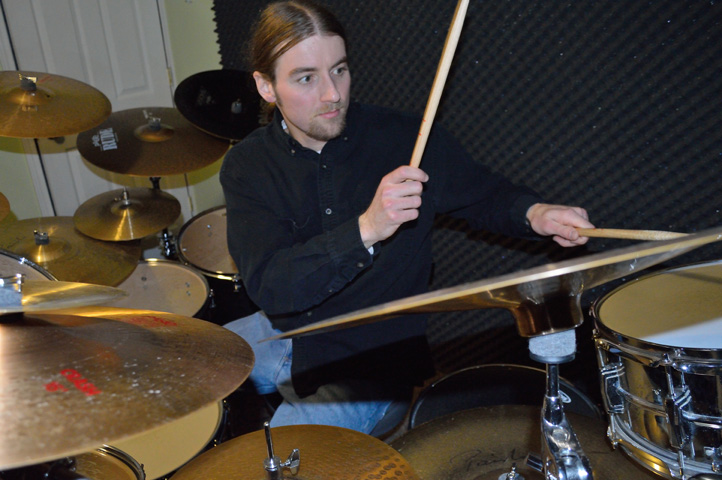 Derek Houle Playing Drum Kit