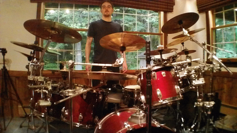 Derek Houle behind his Live Drum Kit